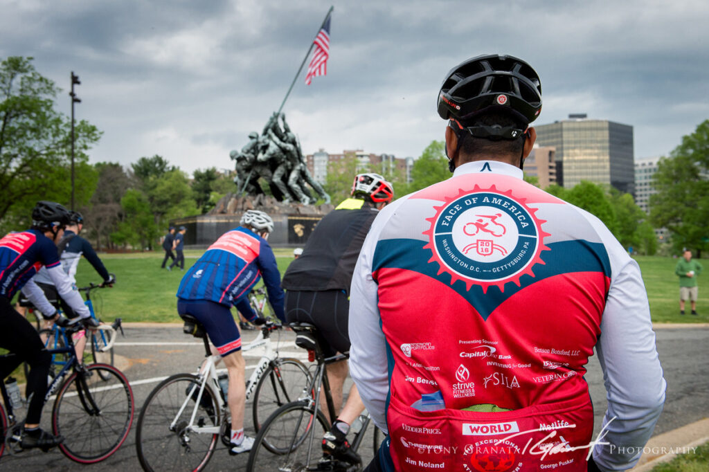 Riders pass the United States Marine Corps War Memorial in Virginia.