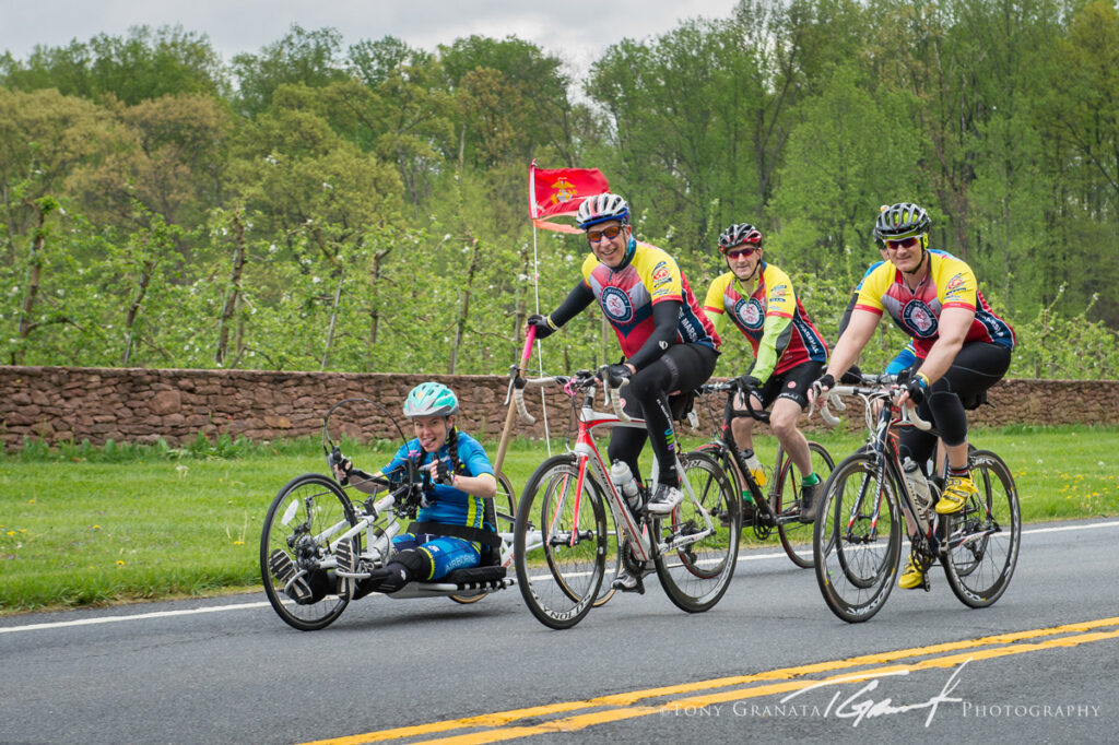 Ride marshals lend a hand to a rider.